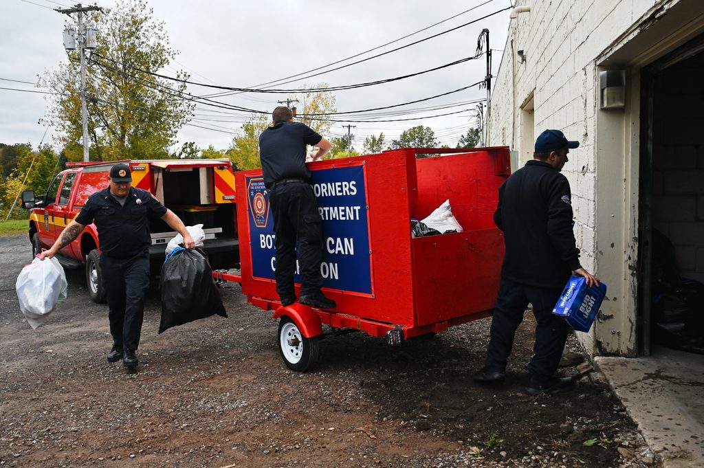 Unloading donated cans and bottles for processing